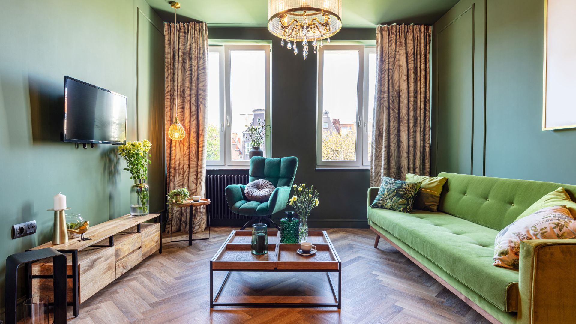 A living room filled with furniture and a flat screen tv