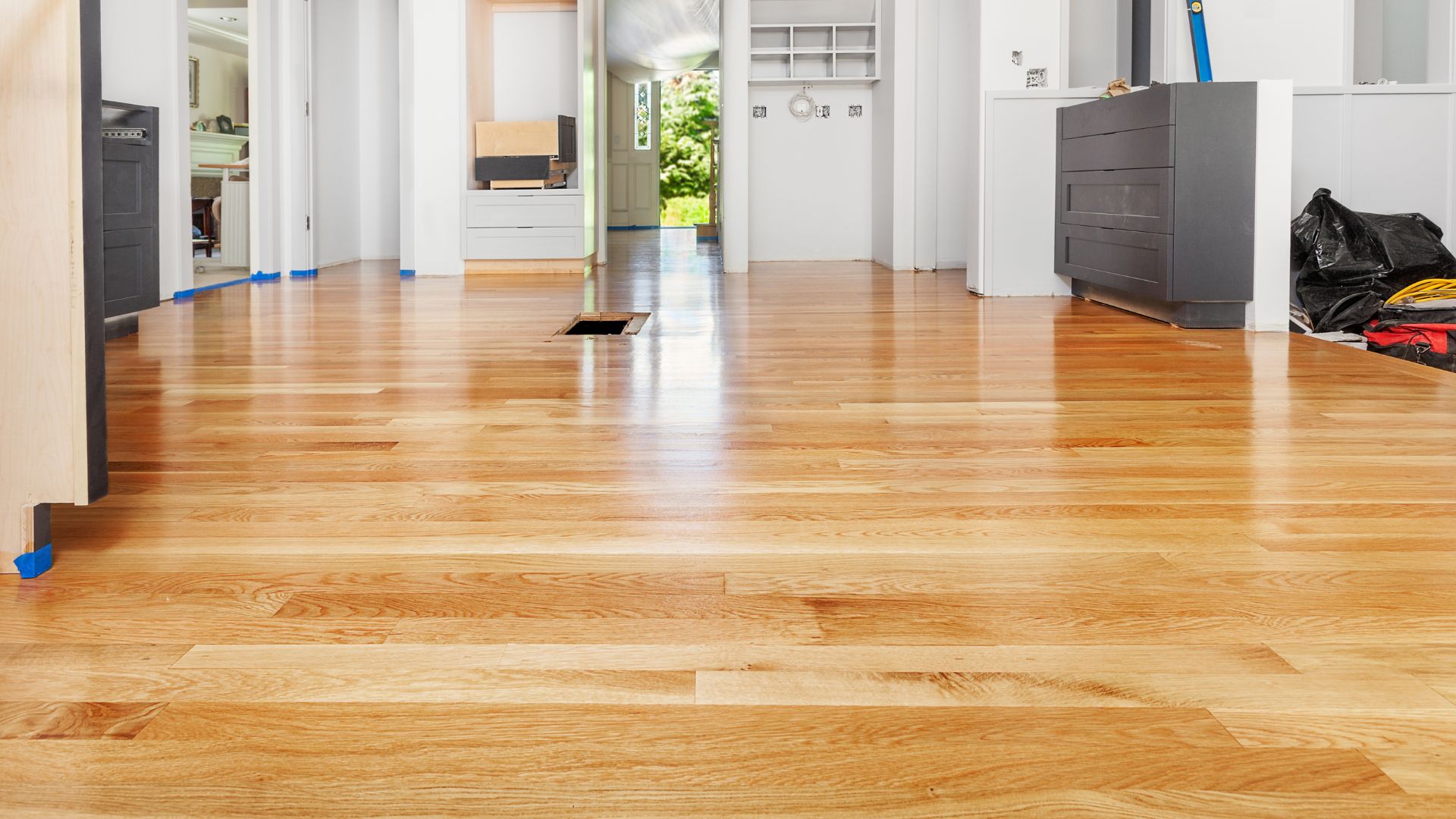 A room with hard wood floors and a hard wood floor